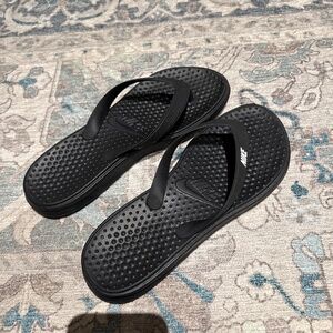 Women’s Black Nike Flip Flops